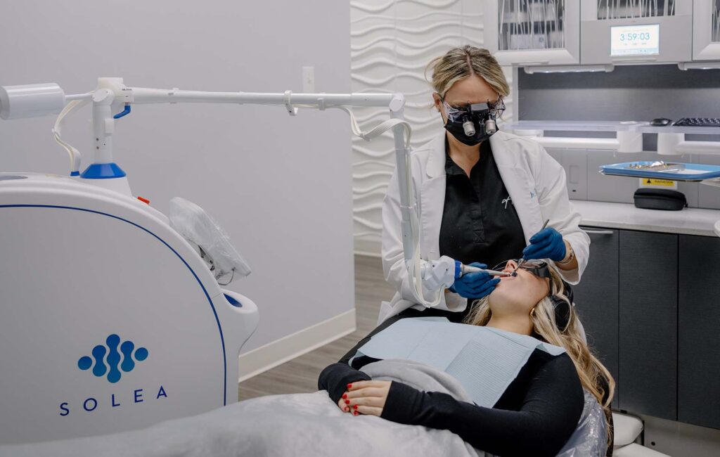 Solea Laser - patient wearing glasses while undergoing laser treatment