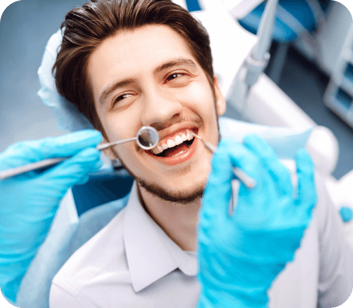 Patient smiling during a cosmetic dentistry procedure for veneers