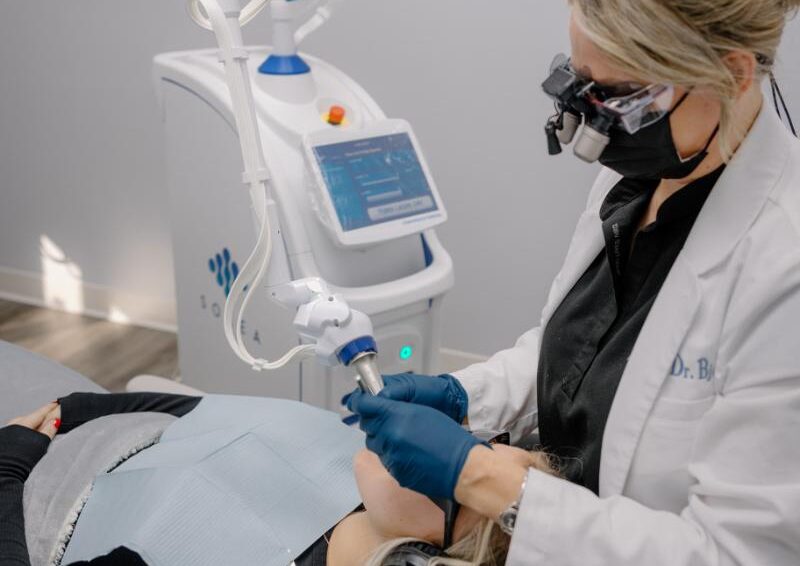 Patient receiving dental treatment during a holistic dentistry appointment in Charlotte, NC.