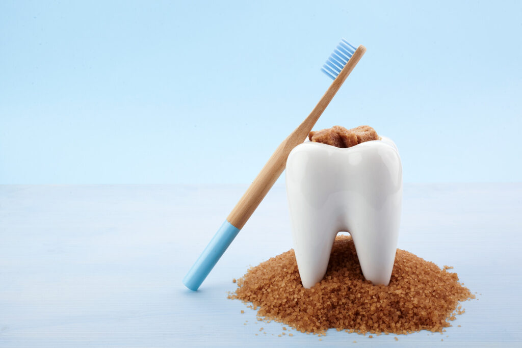 A tooth model and a toothbrush