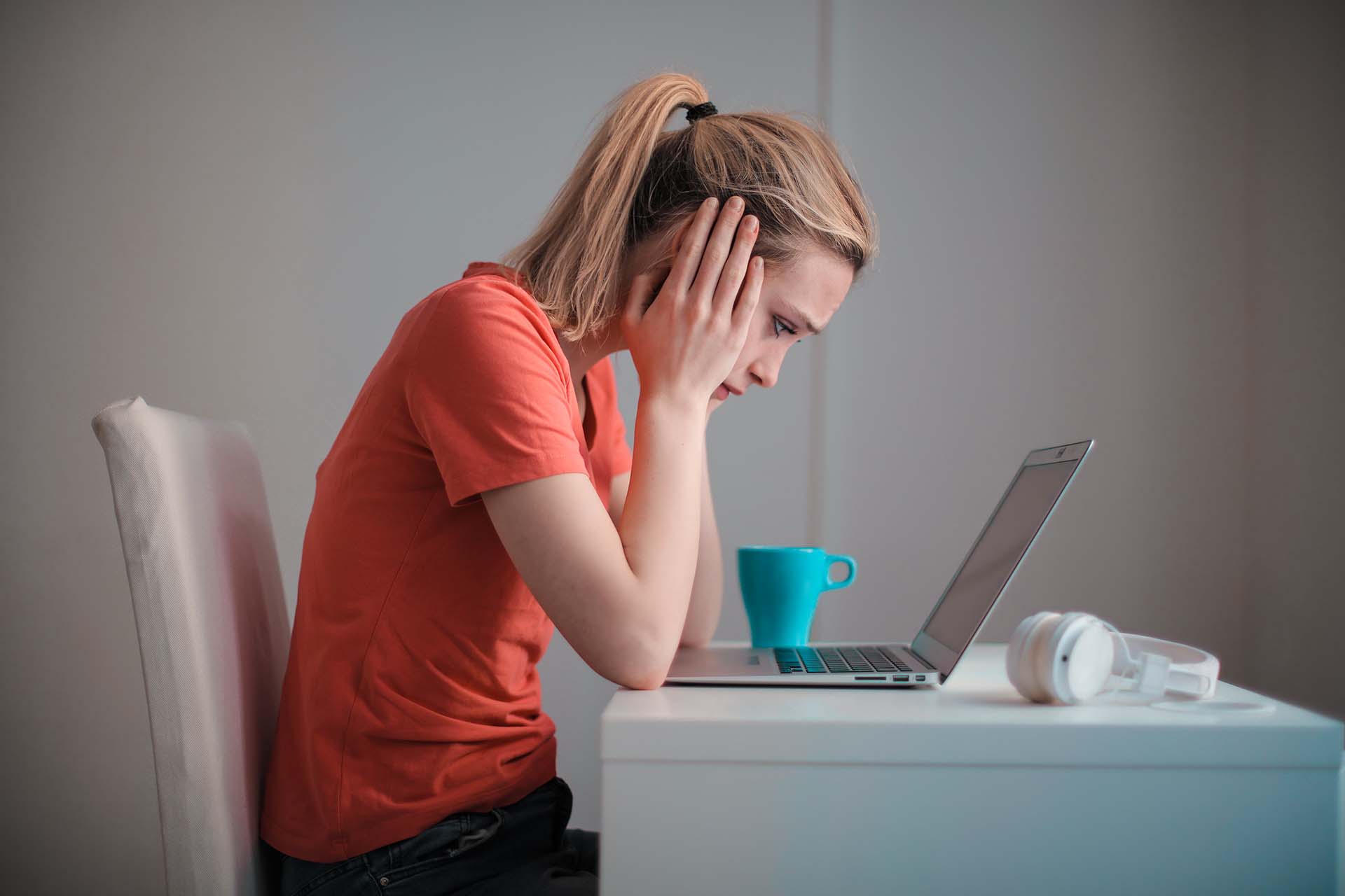 A woman using her laptop at home