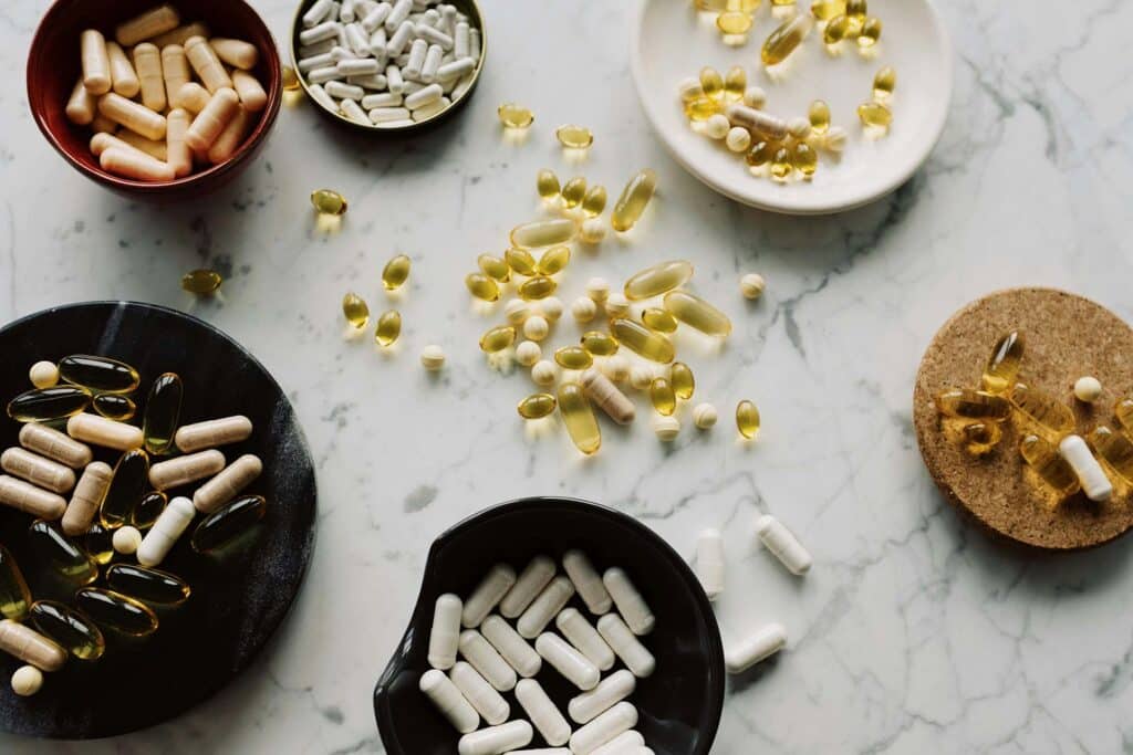 Several different types of pills on a table