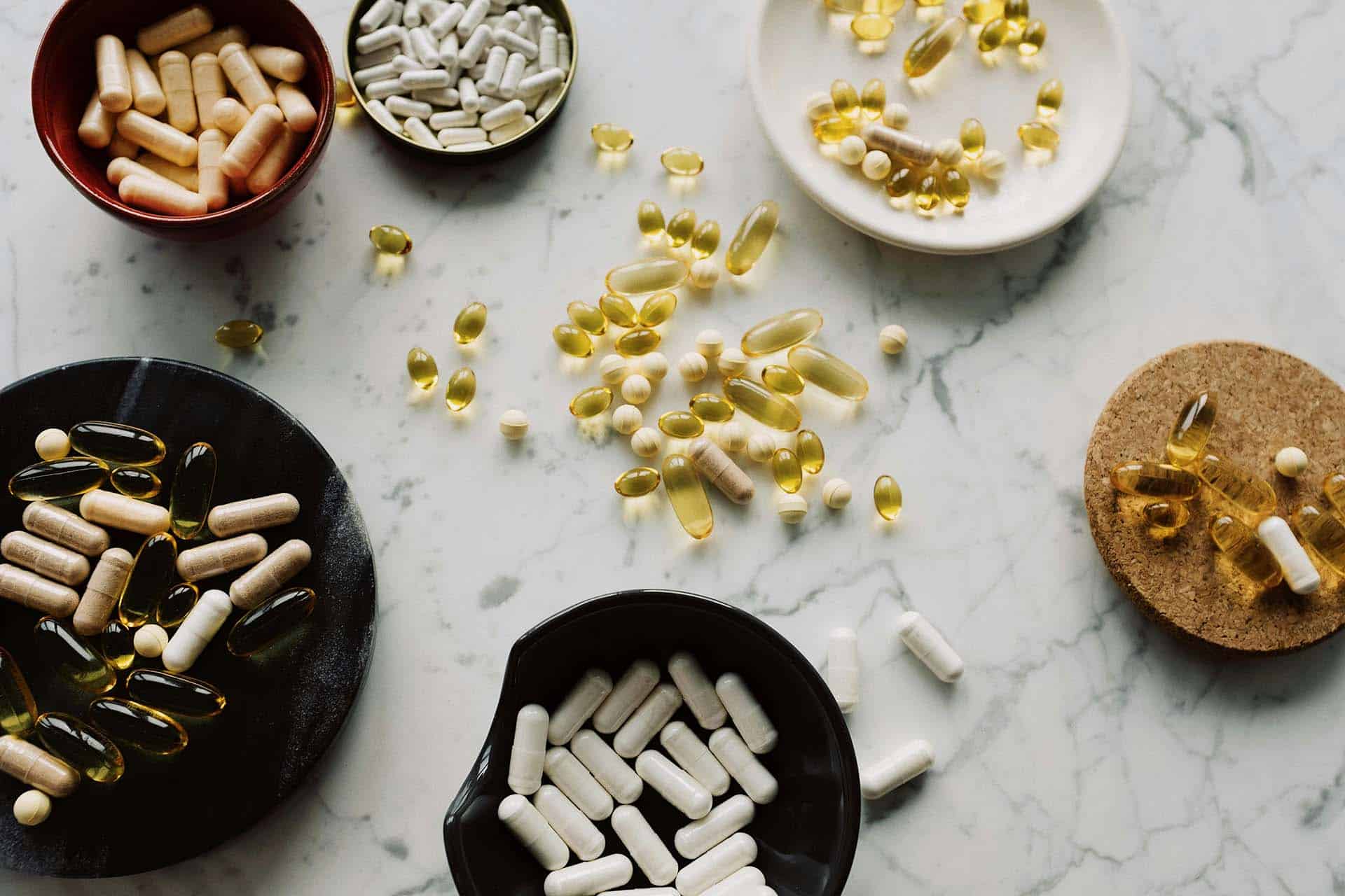 Several different types of pills on a table